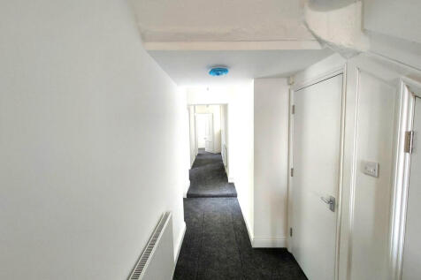 The hallway up to the bedrooms and the bathrooom