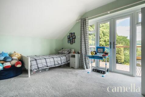 Bedroom Four With Balcony