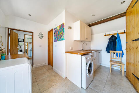 Utility Room Leading to 5th Bedroom and Shower Roo