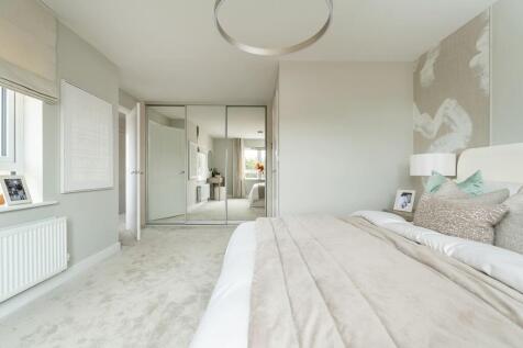 Retreat to the spacious main bedroom