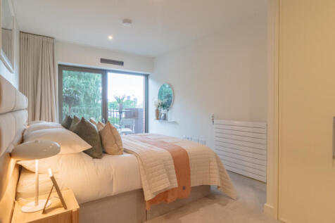 Main bedroom with balcony and built in wardrobe