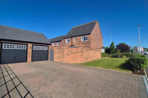Double garage and driveway