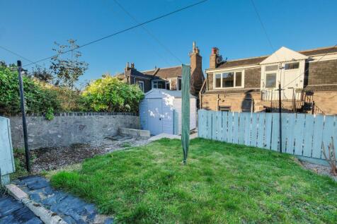 Shared drying green at the rear