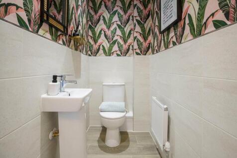 A guest cloakroom completes the ground floor