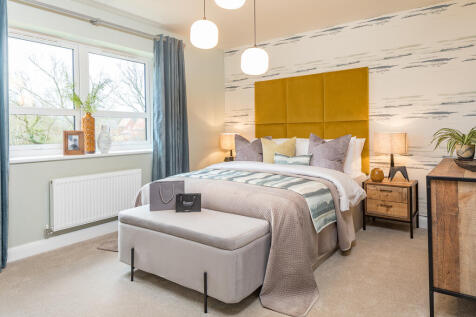 Main double bedroom in the Belmont, 2 bedroom home at St George&#39;s Gate, Newport