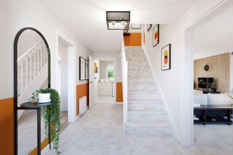A welcoming hallway opens up to the home
