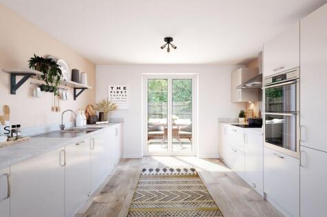 With ample storage and French doors to the rear garden