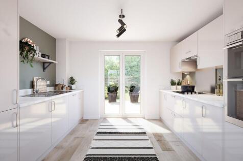 A bright and modern kitchen with ample storage space