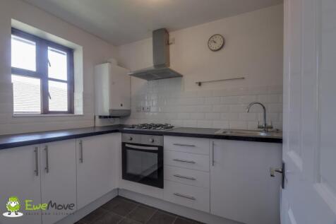Modern kitchen overlooking communal gardens