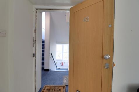 Front door and communal stairwell