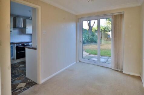 Dining with French Doors to Garden