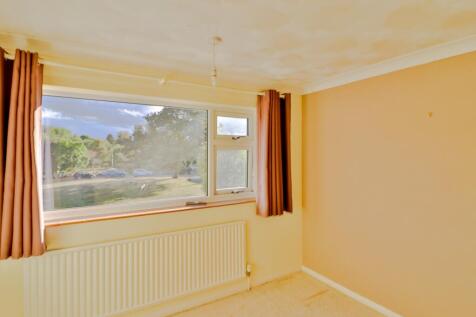 Bedroom 1 with views over the Green