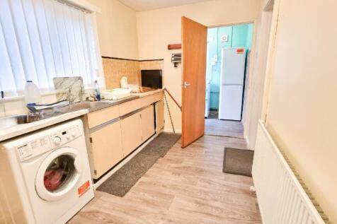 4 Kitchen Leading to Utility Room