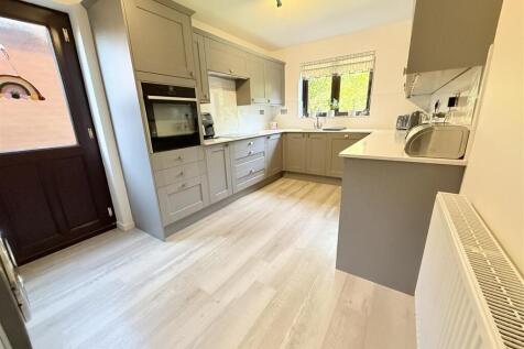 Fitted Kitchen With Utility Area