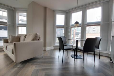 Living room and dining areas