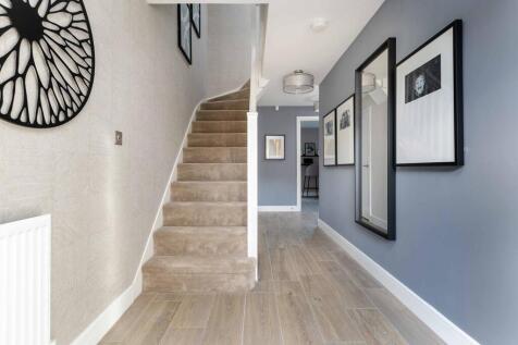 The entrance hall is light and welcoming