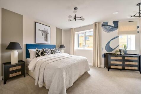 A spacious and bright main bedroom