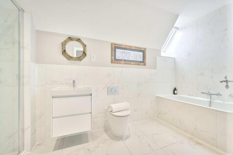 Spacious family bathroom with separate shower and bath