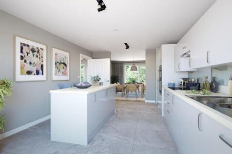 Social kitchen with a convenient breakfast bar, prefect for entertaining