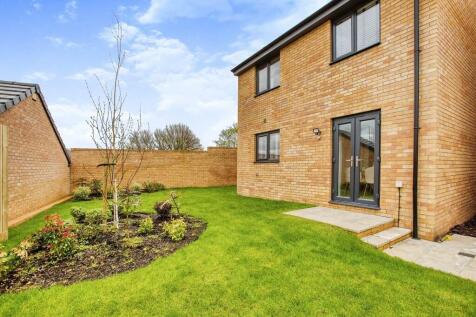French doors open to the rear garden