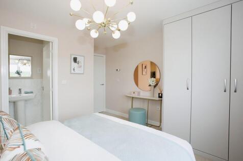 The main bedroom benefits from an en suite shower room