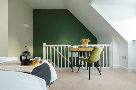 A private staircase leads you to your bedroom suite