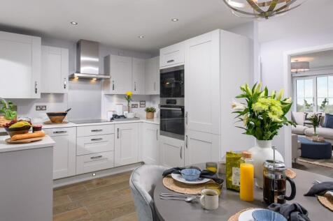 A modern kitchen with ample storage space