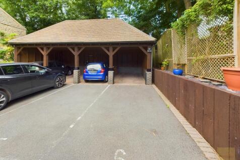 Carport with tandem parking for 2 vehicles.