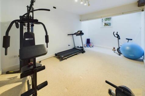 Bedroom currently used as a home gym