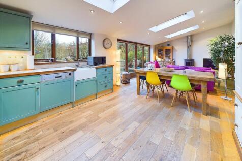 Open plan kitchen, dining, living room.