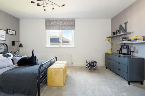 Bedroom 4 enjoys a view over the rear garden