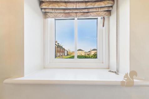 View Out To Side Of Property From Living Room