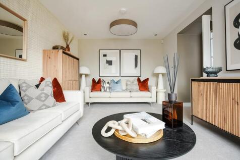 The well-proportioned lounge has space for two 3-seater sofas