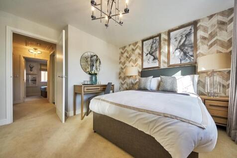 The main bedroom is spacious and inviting - typical Taylor Wimpey home