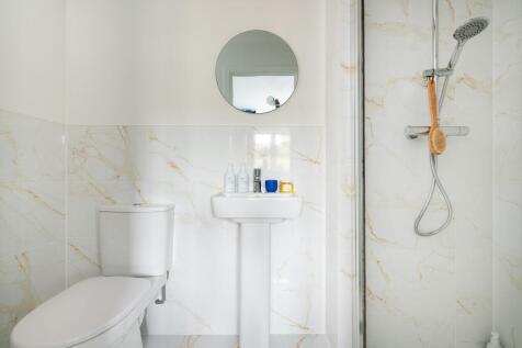 The main bedroom benefits from it&#39;s own en suite shower room
