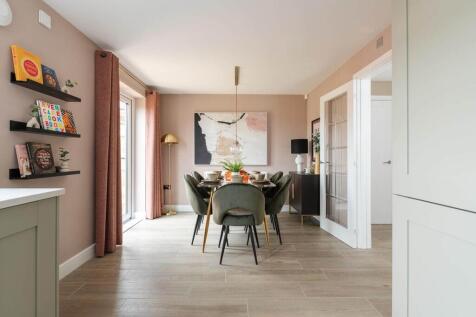 An open plan kitchen dining area offers the perfect space to entertain