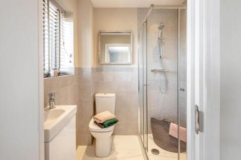 Bedroom 1 also hosts a private en-suite shower room