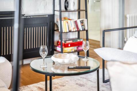 Experience a cozy and inviting living room, per...