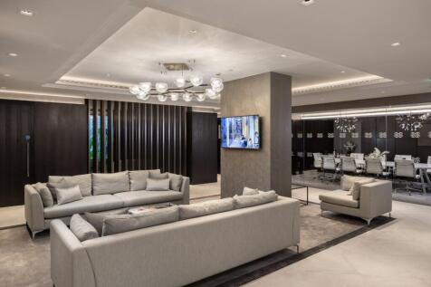 A modern and stylish communal lounge featuring ...