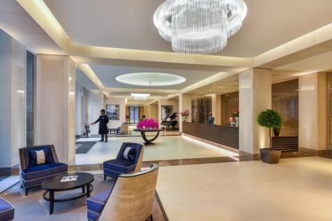 An elegant and spacious reception area featurin...