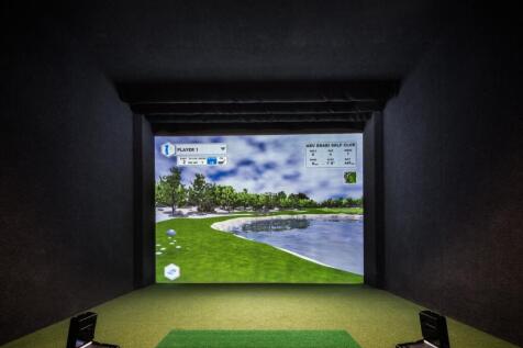 A state-of-the-art indoor golf simulation room ...