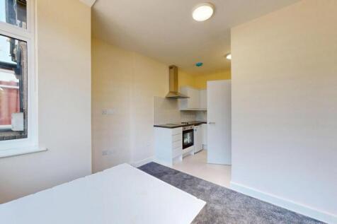 Bright and clean kitchen area featuring modern ...