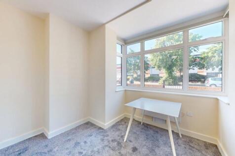 Bright and airy single bedroom featuring a larg...