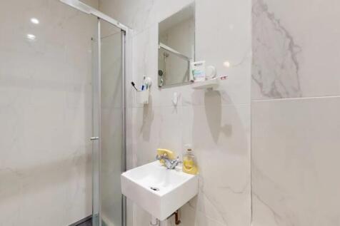 A modern and well-maintained bathroom featuring...