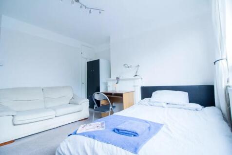 Bright and inviting double bedroom featuring a ...