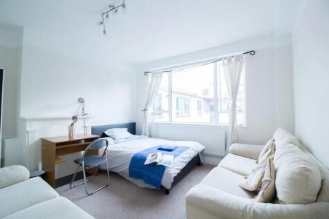 Bright and inviting single bedroom featuring a ...