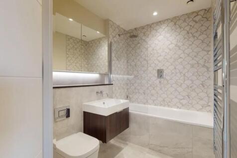 A modern and stylish bathroom suite featuring e...