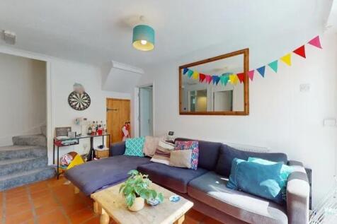 Bright and welcoming living room featuring a sp...