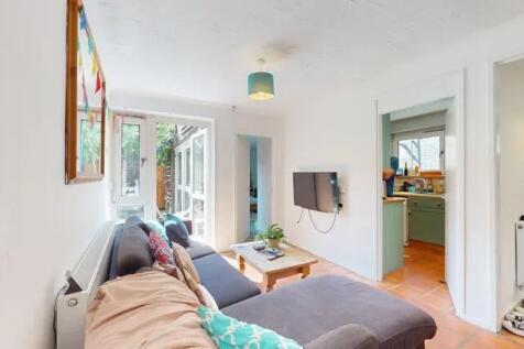 Bright and inviting living room featuring a com...