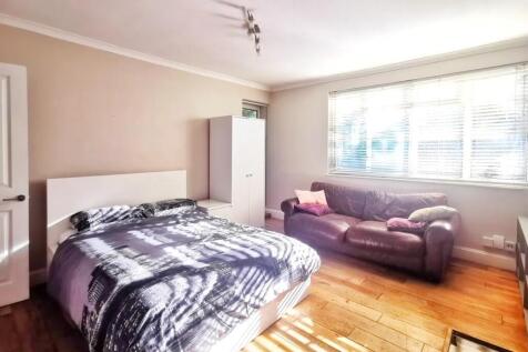 Bright and inviting master bedroom featuring a ...